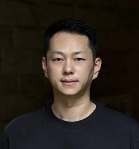 Headshot of Zhu Wang.